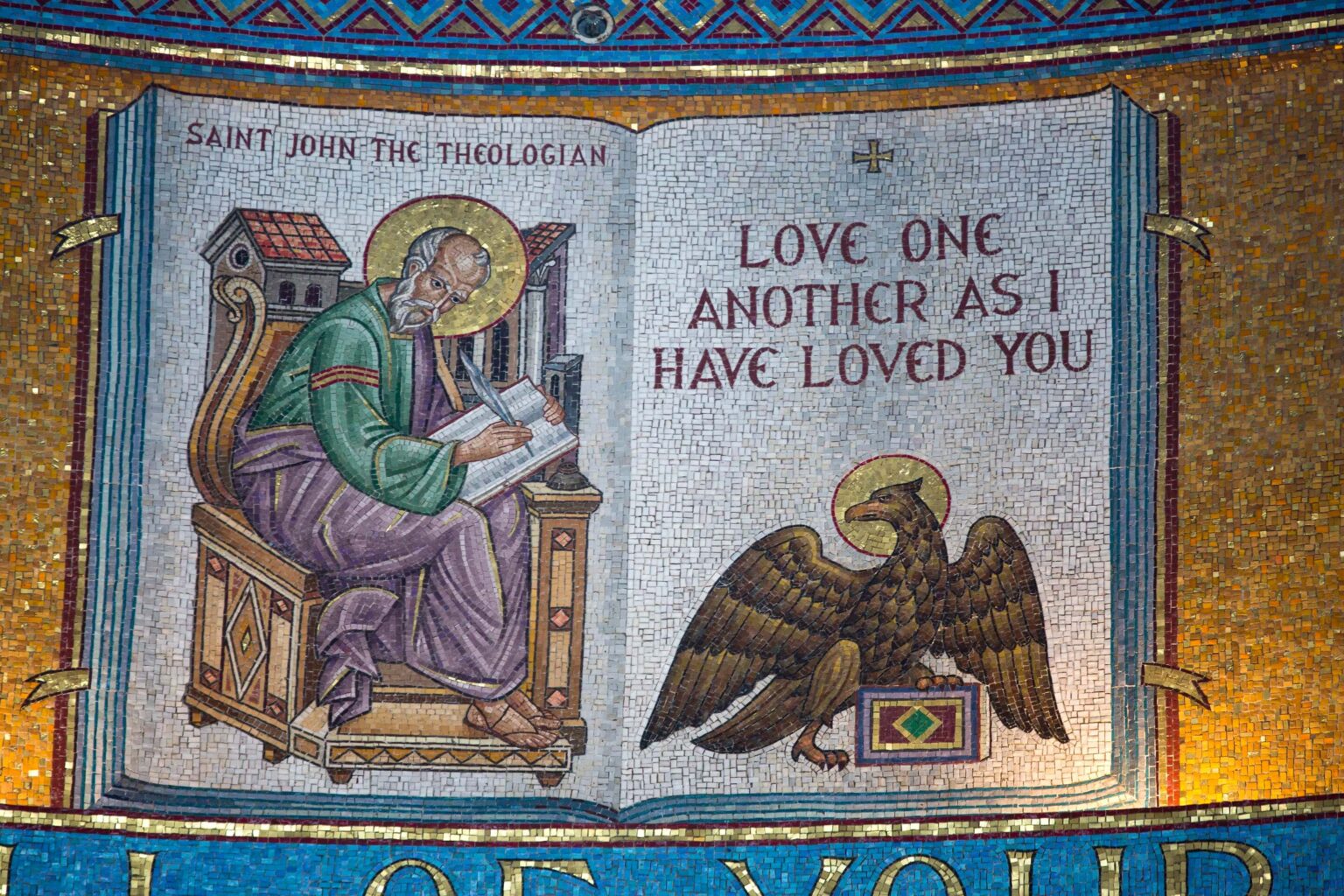 Interior of a Greek Orthodox church featuring Byzantine iconography on the ceiling